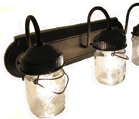 The vanity light fixture?s simplistic and traditional design is the perfect addition to your interior home decor. Bathroom Vanity Bar Trio Light Fixture Of Pint Mason Jars ...