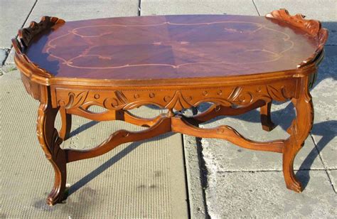 A coffee table can house books, floral arrangements, candles, cute decorations, unique accessories and often come with a great centerpiece. UHURU FURNITURE & COLLECTIBLES: SOLD Ornate Coffee Table ...