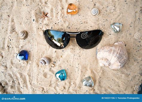 Black Sunglasses On The Beach In The Sand Stock Photo Image Of