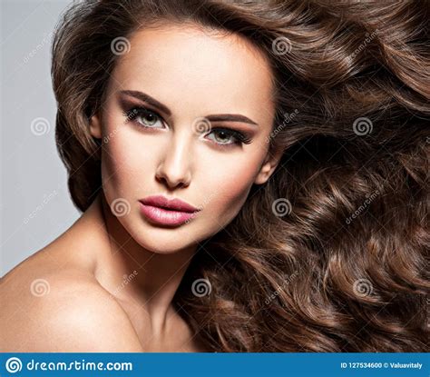 Face Of A Beautiful Woman With Long Brown Hair Stock Photo Image Of