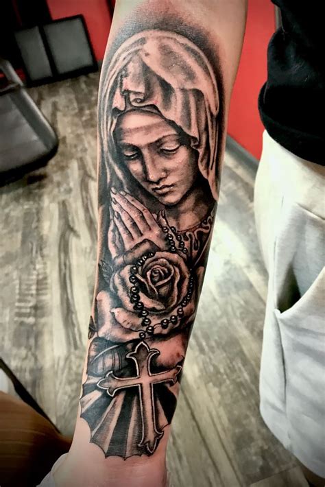 Virgin Mary Rose And Cross Tattoo On Forearm Done At Redinktattoostudio Jun Th