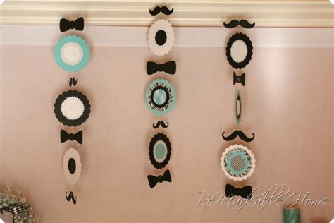 Baby showers are about marking the transition from pregnancy to parenthood, but they are also a wonderful opportunity to create mementos of the occasion for the new parents and child to treasure. I Heart Pears: Little Man Baby Shower - mustaches and bow ties