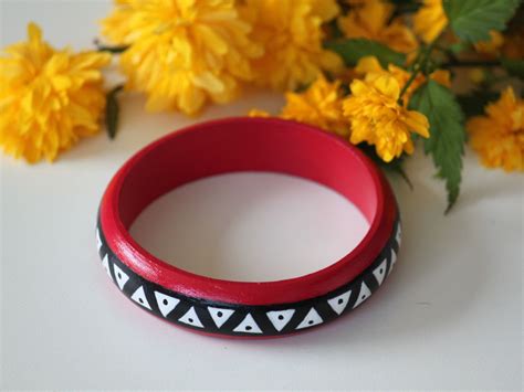 aztec-hand-painted-bangles-handpainted-wooden-bracelet-with-black,-white-and-ruby-maya-pattern