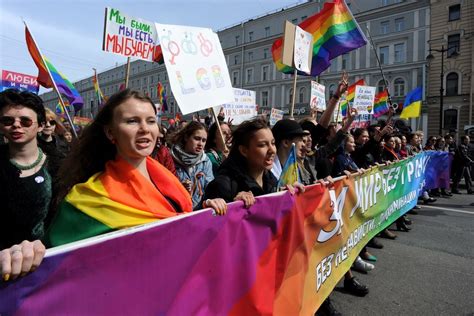 russian lgbt activists march in rainbow may day