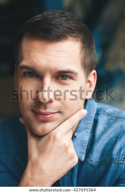 Attractive Smart Guy Thinking About Something Stock Photo 427695364