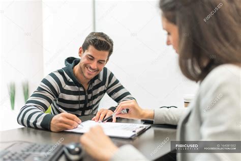 Signing Stock Photos Royalty Free Images Focused