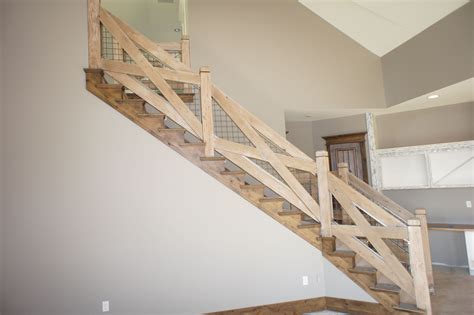 Custom house designed by husband & wife team | modern farmhouse inspired. farmhouse railings | Think outside of the box with a stair railing design | Stair railing design ...