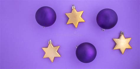Christmas Banner With Purple Balls And Gold Stars On A Purple