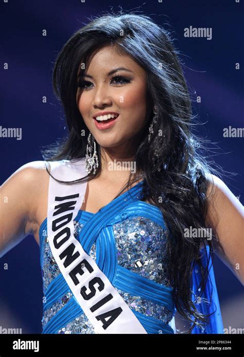 miss indonesia zivanna letisha siregar poses on the runway in the evening gown segment of the