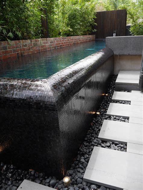 Corner Detail Of This Fantastic Infinity Edge Pool With A Black Glass