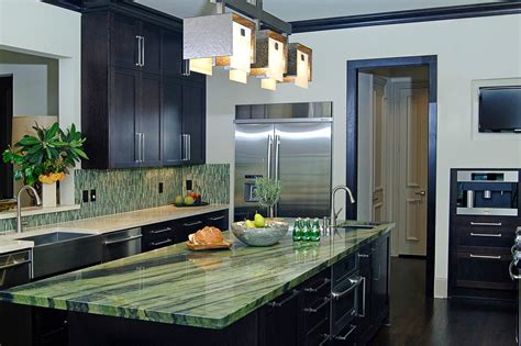 This type of countertop, while made from recycled materials, cannot be recycled again, so even though you saved the plastic once, you won't be so. Contemporary Kitchen With Green Island Countertop | HGTV