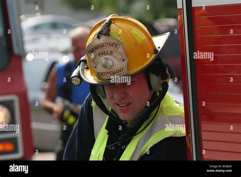 A Firefighter Lieutenant At The Scene Of A Emergency Fire Call Stock