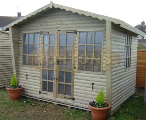 traditional summerhouse with veranda pressure treated skinners sheds