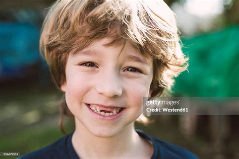 Portrait Of Blond Boy With A Big Smile High Res Stock Photo Getty Images