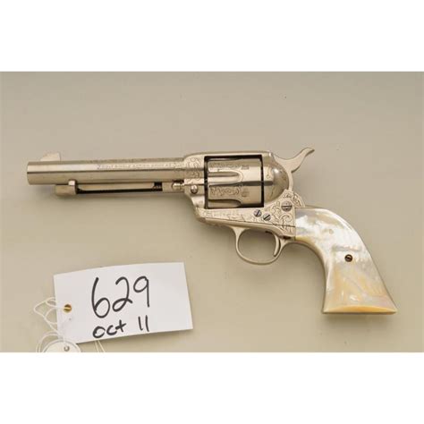 colt saa revolver 45 cal 5 1 2” barrel nickel finish with engraving thru the finish butt of