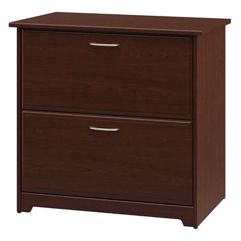 Whether metal or wood, a filing cabinet with two drawers takes up a small amount of space while holding a large amount of papers. 2-Drawer Lateral File Cabinet in Cherry Wood Finish