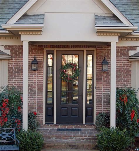 Black Front Door With Glass And Wreath Sidelights Red Brick House With