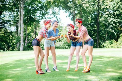 Group Of Friends At Park Having Fun Party Cheerful Girls With A Cakes In Hands Retro Style