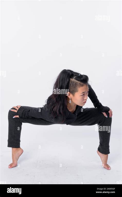 Full Body Shot Of Beautiful Asian Woman Stretching Stock Photo Alamy