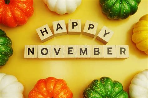 Happy November Alphabet Letter With Pumpkin Frame On Yellow Background