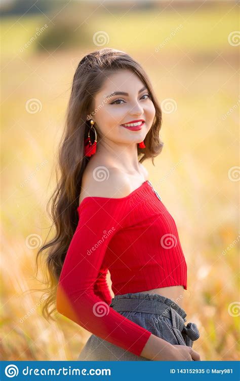 One Beautiful Female Caucasian High School Senior Girl In Red Crop Top