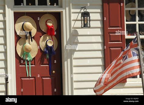 Straw Hats Decorating Door In Colonial Williamsburg Va Usa Stock