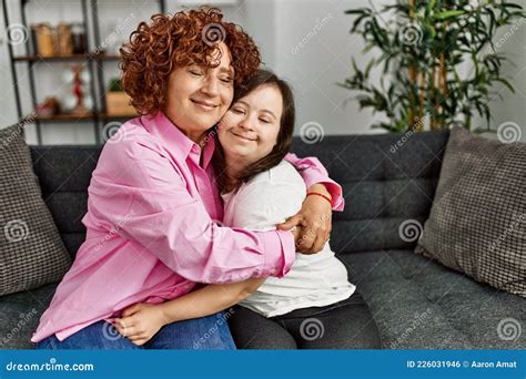 Mature Mother And Down Syndrome Daughter At Home Hugging With Love My Xxx Hot Girl