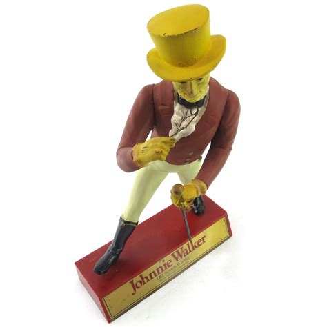 Johnnie Walker Striding Man Figurine Whisky Auctioneer