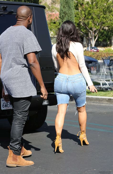 kim kardashian in open back shirt and jeans 13 gotceleb