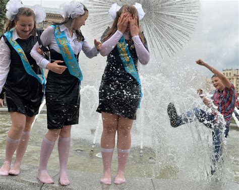 Ukrainian Students Heckle As They Traditionally Bath In A Fountain