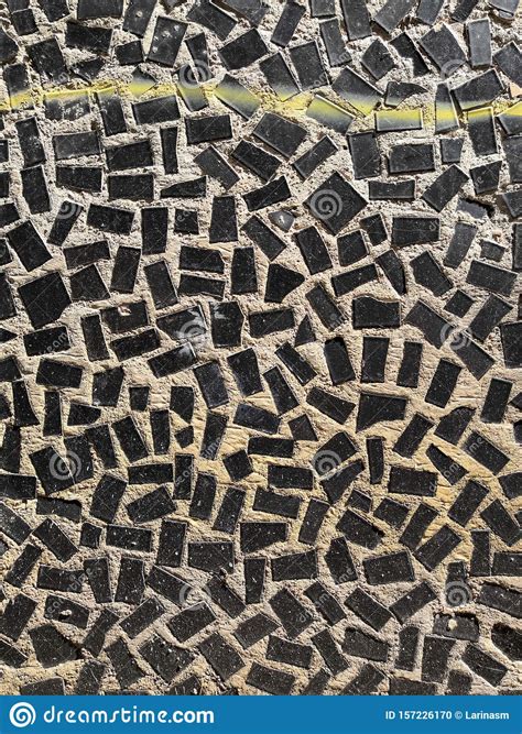 Black Mosaic Tiles On The Wall Of The House Architectural Abstract
