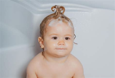 Premium Photo Happy Baby Face In Bubble Bath Baby Bathes In A Bath