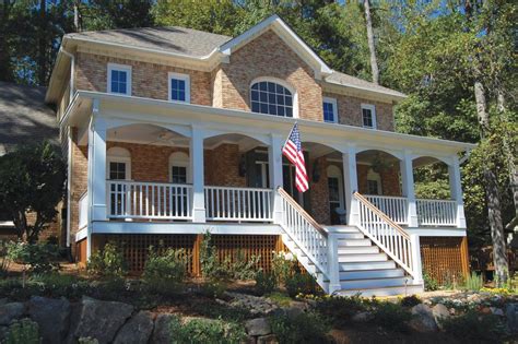 Traditional Front Porch With Wood Stairs And Railing Hgtv