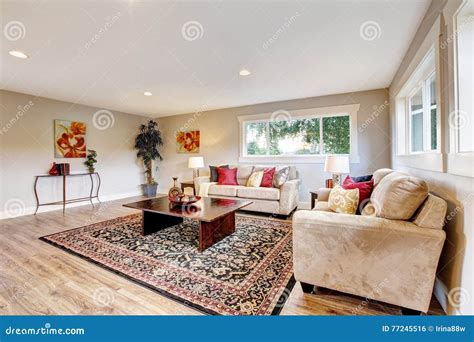 Spacious Living Room Interior With Polished Hardwood Stock Photo