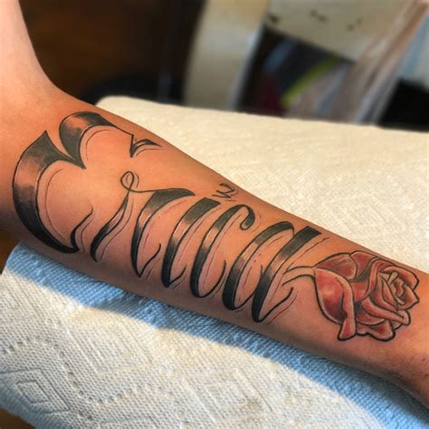 Names with hearts the name max is embellished with a heart on one wearer's forearm while the name jennifer is embellished with a heart on the other. Negative Effect Name Tattoos On Forearm With Roses - 4 ...