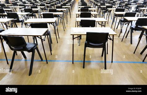 View Of Large Exam Room Hall And Examination Desks Tables Lined Up In