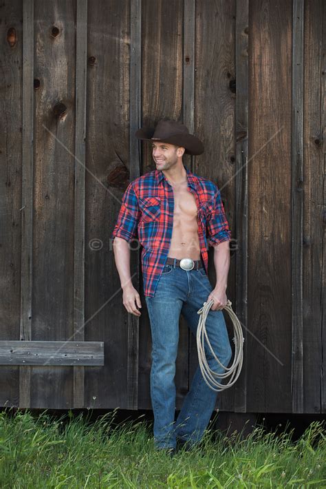 Rugged Shirtless Cowboy On A Ranch Rob Lang Images