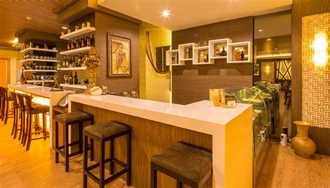 Introducing a bar in a kitchen is undoubtedly an excellent idea for creating extra work space, dining space and for extra convenience. Wall Covering Ideas for a New Home Decoration | Roy Home ...