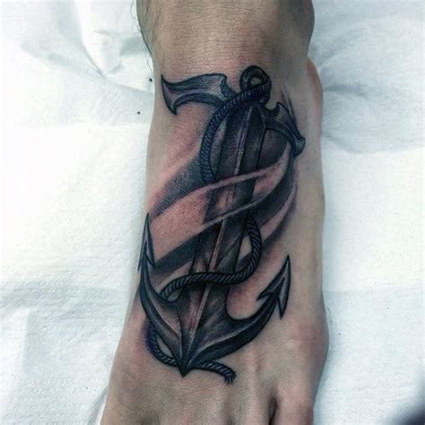Illuminati eye with danger skull tattoo on feet. 90 Foot Tattoos For Men - Step Into Manly Design Ideas