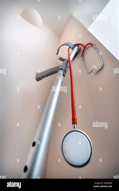 A Hospital Walking Crutch And A Doctors Stethoscope Stock Photo Alamy