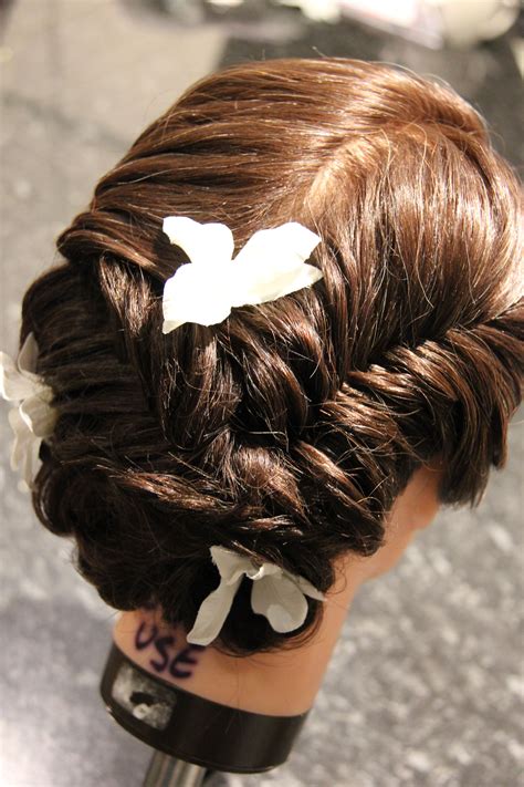 A braided wedding hairstyle is such a popular choice as they generally hold in place well all day, and there is so much versatility with gorgeous styles for both long and short hair. Braided Fishtail Bridal Hair Designs | Hair designs, Hair ...