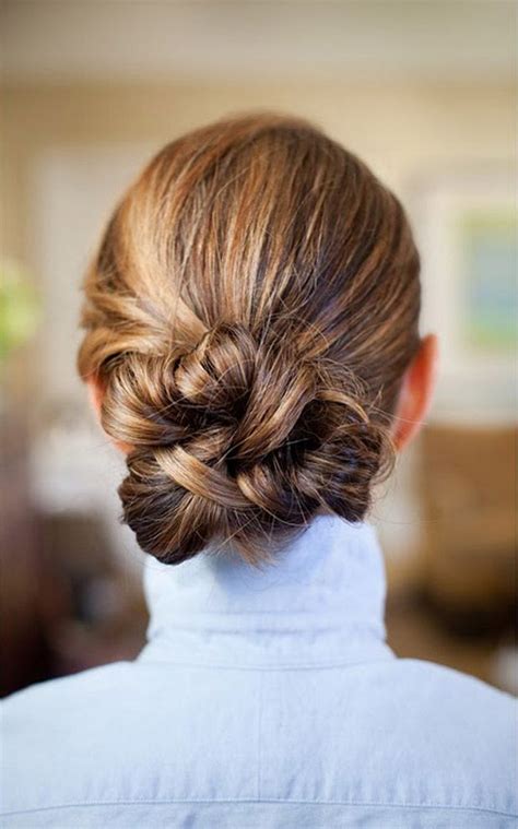 Cornrows braided into a bun. Try a Summer Twisted Updo: Updo Hair Designs - Pretty Designs