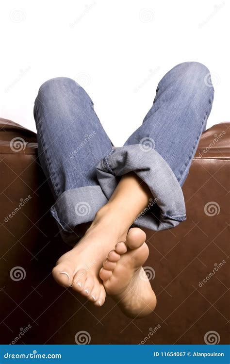Womans Feet Over Couch Crossed Stock Image Image 11654067
