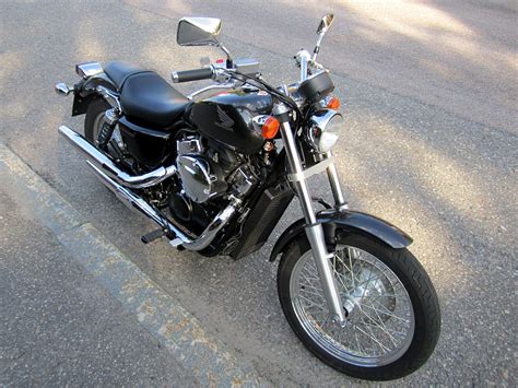 Understated when it comes to bright colors or chrome. 2014 Honda VT 750 Shadow Phantom: pics, specs and ...
