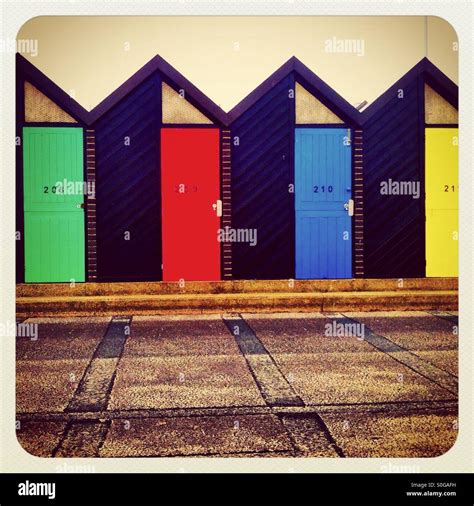 A Row Of Brightly Coloured Beach Huts Lowestoft Stock Photo Alamy