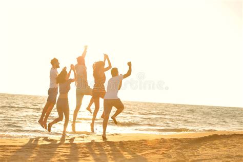 Happy Young People Group Have Fun On Beach Stock Photo Image Of