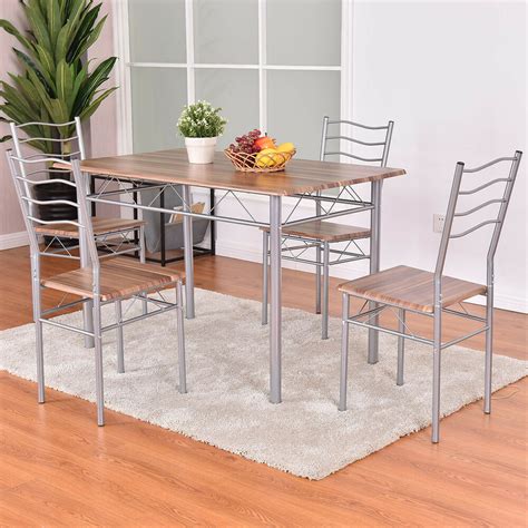 The table not only serves as a spot for eating, but it also anchors decor scheme of the room. 5 Piece Dining Set Wood Metal Table and 4 Chairs Kitchen ...
