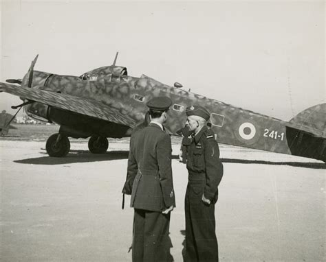 Marshal Ie Brodie Royal Air Force Speaking With Italian Pilots On