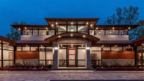 This Contemporary Lake House Embraces Stone Wood And Glass Realstone