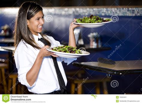 Hispanic Waitress Serving Salads Stock Image - Image of work, restaurant: 10530451